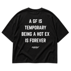 Back view of the black A GF IS TEMPORARY BEING A HOT EX IS FOREVER Oversized T-Shirt by MALVICE.