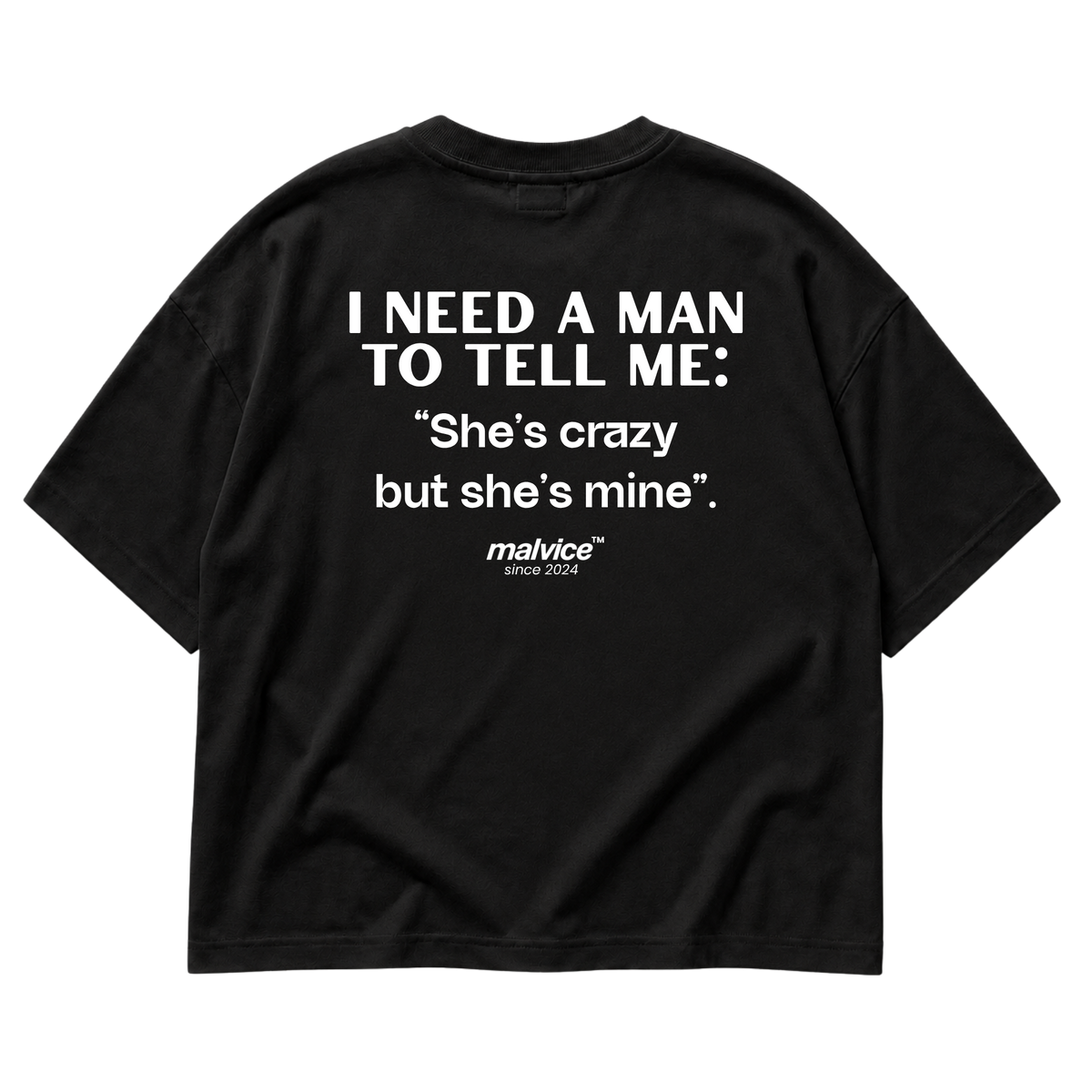 Back view of the black I NEED A MAN TO TELL ME: She’s crazy but she’s mine Oversized T-Shirt by MALVICE.
