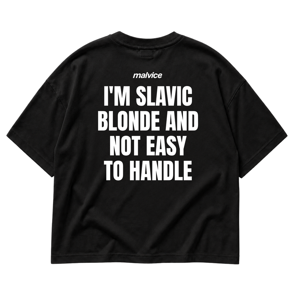 Back view of the black I'M SLAVIC BLONDE AND NOT EASY TO HANDLE Oversized T-Shirt by MALVICE.
