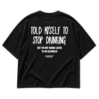 Back view of the black TOLD MYSELF TO STOP DRINKING Oversized T-Shirt by MALVICE.