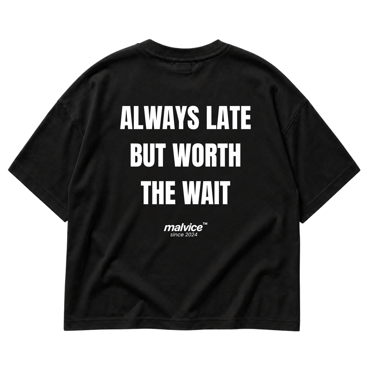 Back view of the black ALWAYS LATE BUT WORTH THE WAIT Oversized T-Shirt by MALVICE.