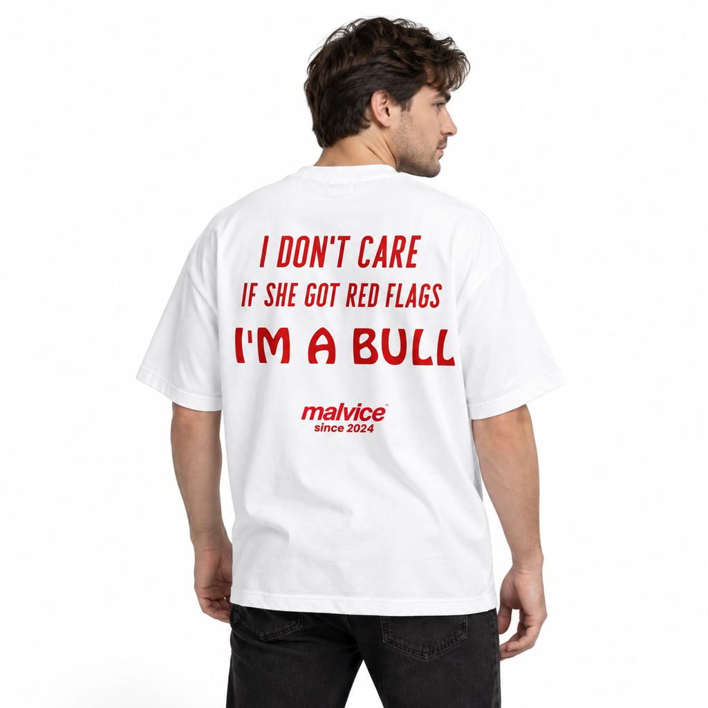 I DON'T CARE IF SHE GOT RED FLAGS I'M A BULL Oversized T-Shirt