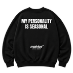 Black MALVICE oversized sweatshirt with “MY PERSONALITY IS SEASONAL” back print