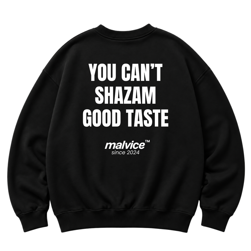 Black MALVICE oversized sweatshirt with “YOU CAN’T SHAZAM GOOD TASTE” back print