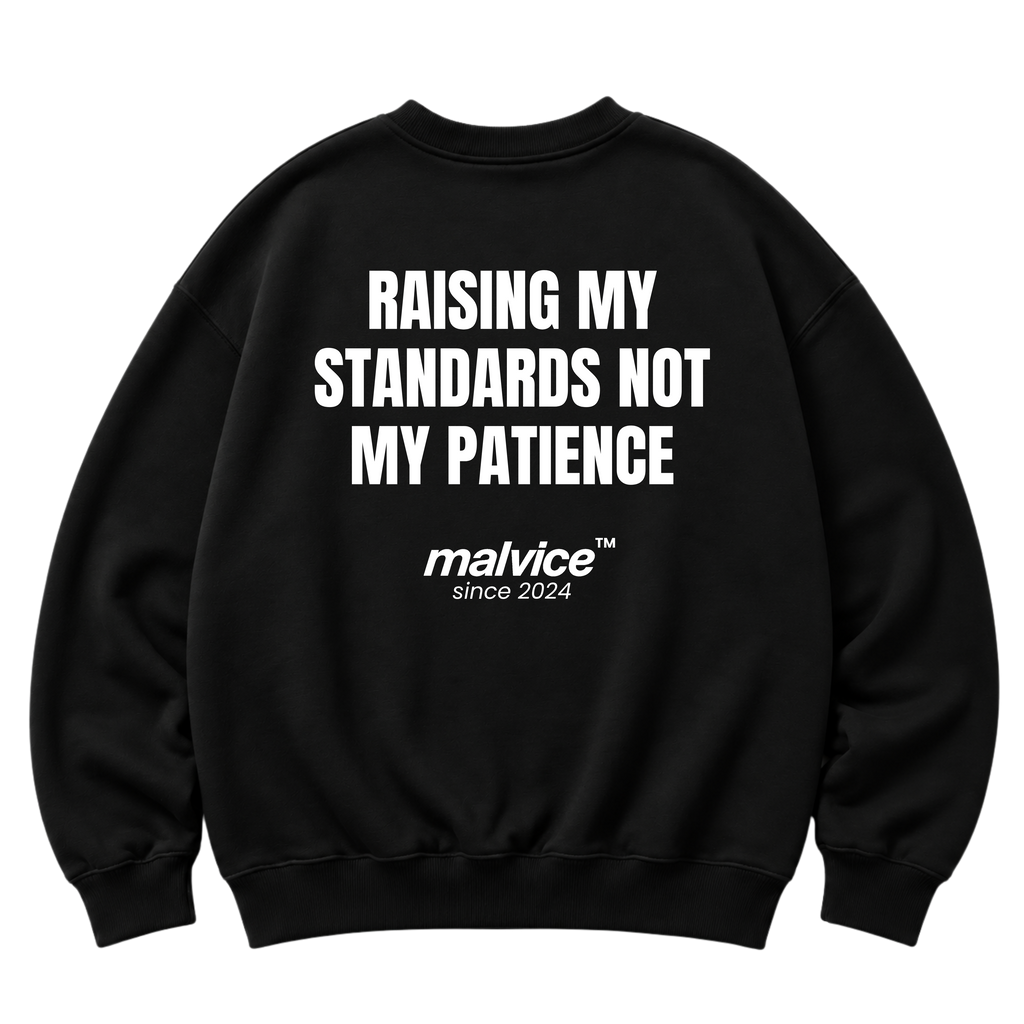 Black MALVICE oversized sweatshirt with “RAISING MY STANDARDS NOT MY PATIENCE” back print