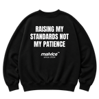 Black MALVICE oversized sweatshirt with “RAISING MY STANDARDS NOT MY PATIENCE” back print