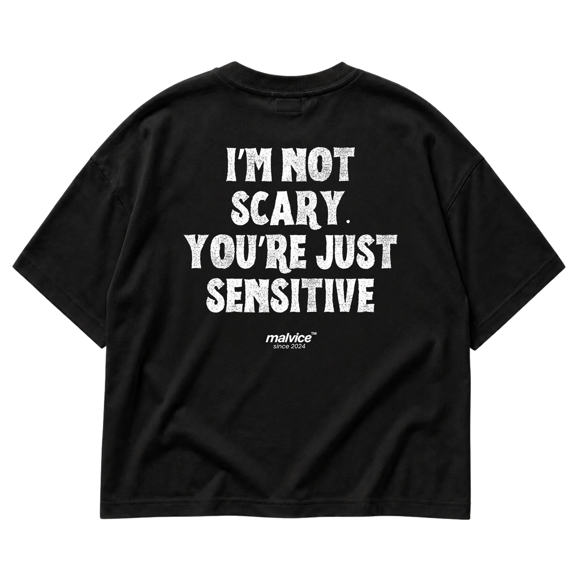 Black MALVICE oversized T-shirt with “I’M NOT SCARY. YOU’RE JUST SENSITIVE” back print
