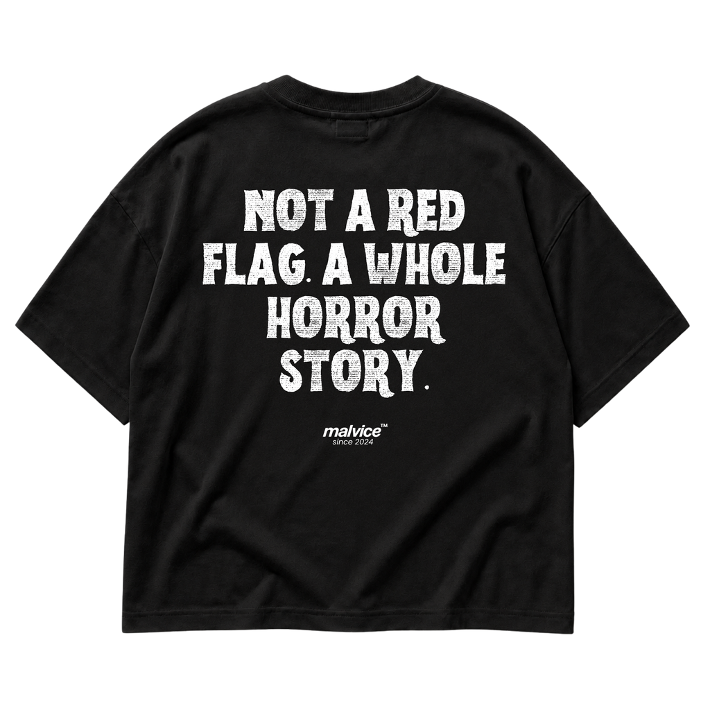 Black MALVICE oversized T-shirt with “NOT A RED FLAG. A WHOLE HORROR STORY” back print