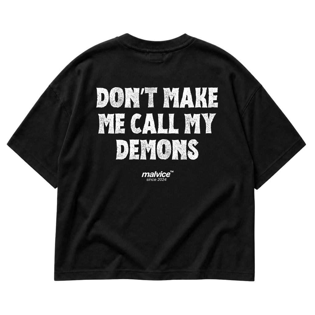 Black MALVICE oversized T-shirt with “DON’T MAKE ME CALL MY DEMONS” back print