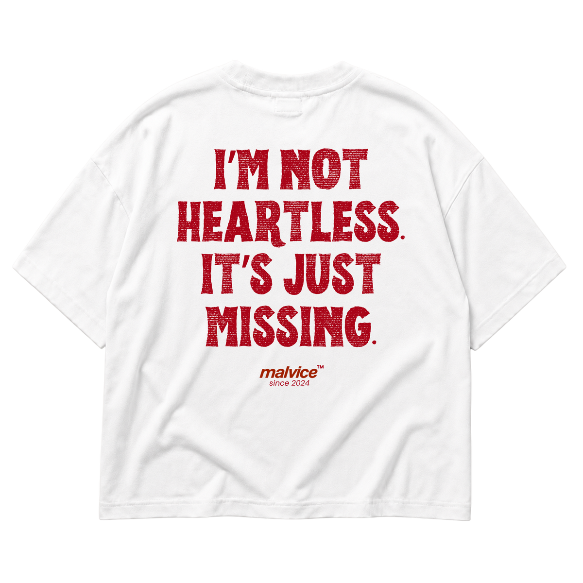 White MALVICE oversized T-shirt with “I’M NOT HEARTLESS. IT’S JUST MISSING” back print
