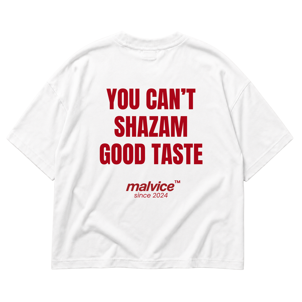 White MALVICE oversized T-shirt with “YOU CAN’T SHAZAM GOOD TASTE” back print