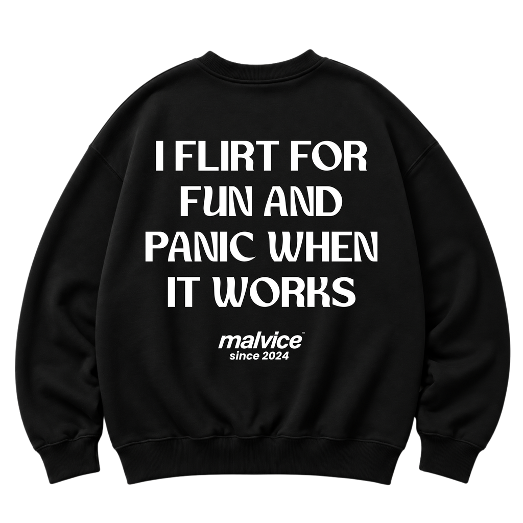Black MALVICE oversized sweatshirt with “I FLIRT FOR FUN AND PANIC WHEN IT WORKS” back print