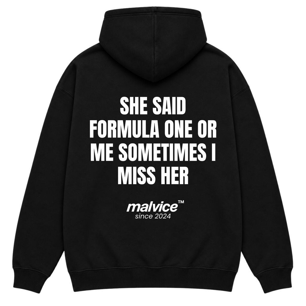 Black MALVICE oversized hoodie with “SHE SAID FORMULA ONE OR ME SOMETIMES I MISS HER” back print