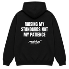 Black MALVICE oversized hoodie with “RAISING MY STANDARDS NOT MY PATIENCE” back print