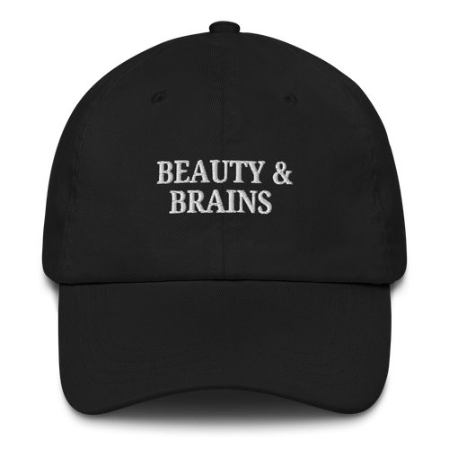 Black MALVICE adjustable dad hat with “BEAUTY & BRAINS” front embroidery