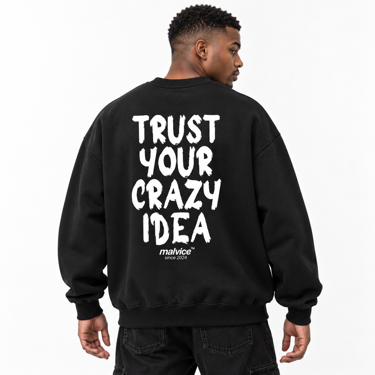 TRUST YOUR CRAZY IDEA Oversized Sweatshirt black young adult model back view