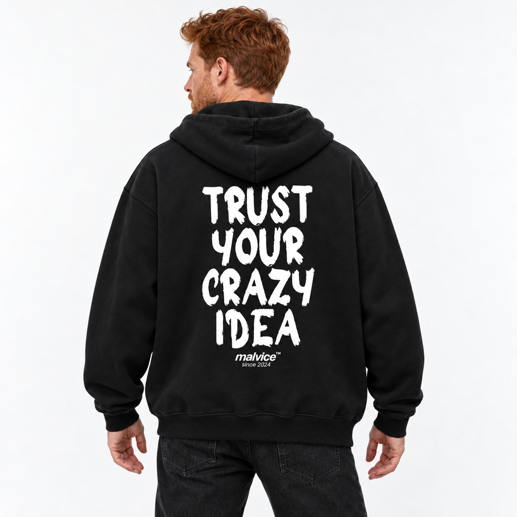 TRUST YOUR CRAZY IDEA Oversized Hoodie black young adult model back view