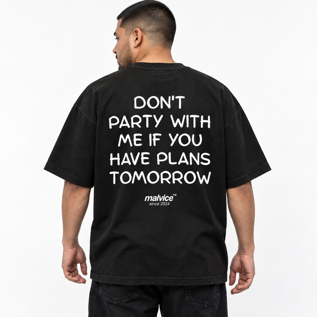 DON'T PARTY WITH ME IF YOU HAVE PLANS TOMORROW Oversized T-Shirt black young adult model back view