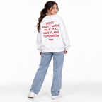 DON'T PARTY WITH ME IF YOU HAVE PLANS TOMORROW Oversized Sweatshirt white young adult model back view