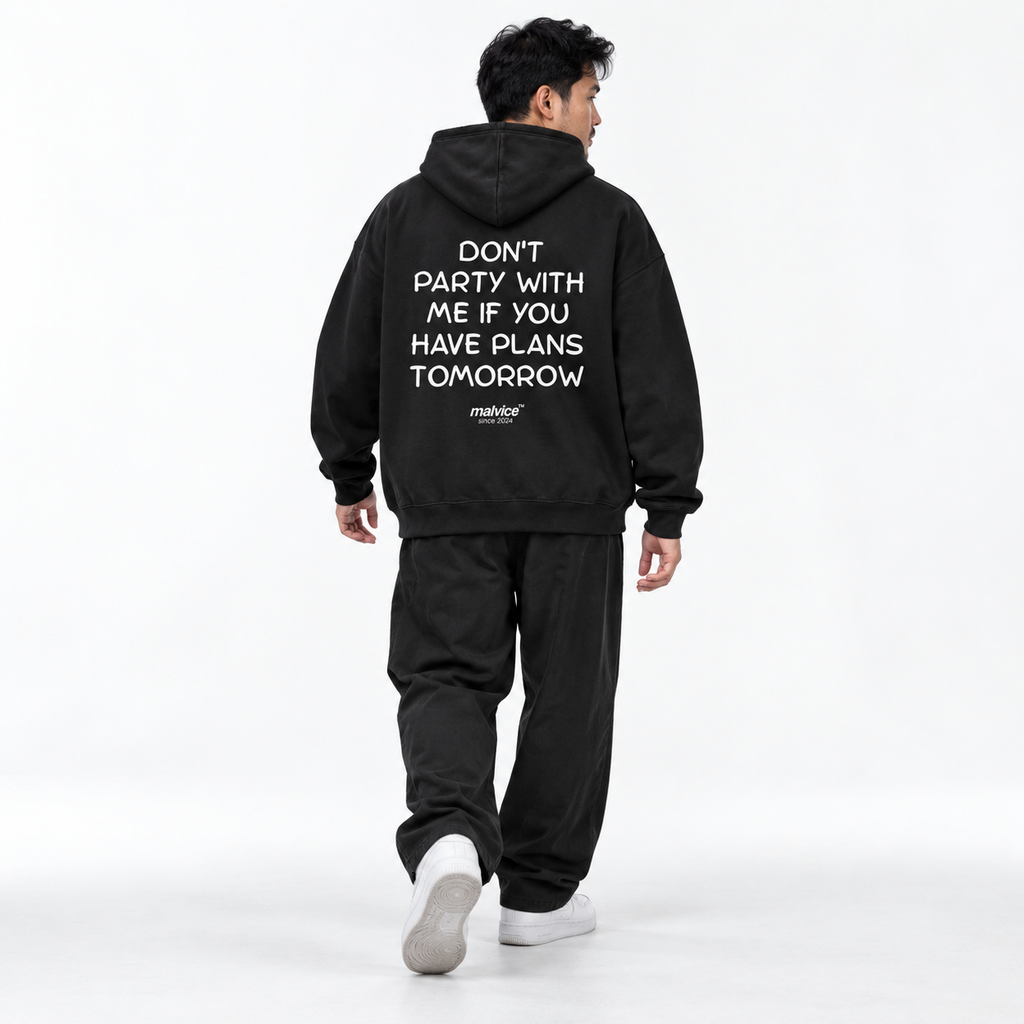 DON'T PARTY WITH ME IF YOU HAVE PLANS TOMORROW Oversized Hoodie black young adult model back view