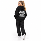 I'M SLAVIC BLONDE AND NOT EASY TO HANDLE Oversized Hoodie black young adult model back view