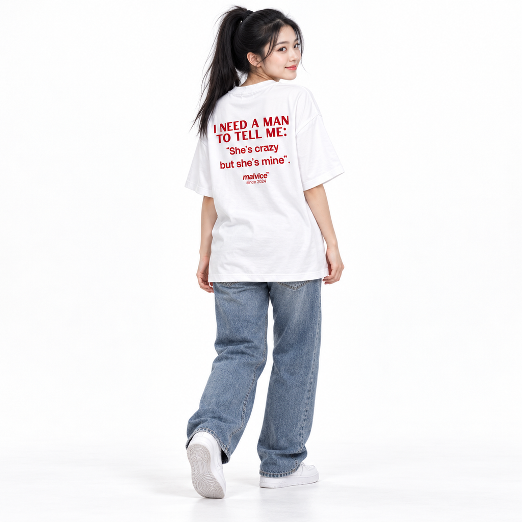 I NEED A MAN TO TELL ME: She’s crazy but she’s mine Oversized T-Shirt white young adult model back view