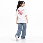 I NEED A MAN TO TELL ME: She’s crazy but she’s mine Oversized T-Shirt white young adult model back view