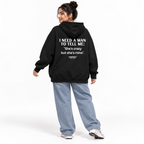 I NEED A MAN TO TELL ME: She’s crazy but she’s mine Oversized Hoodie black young adult model back view