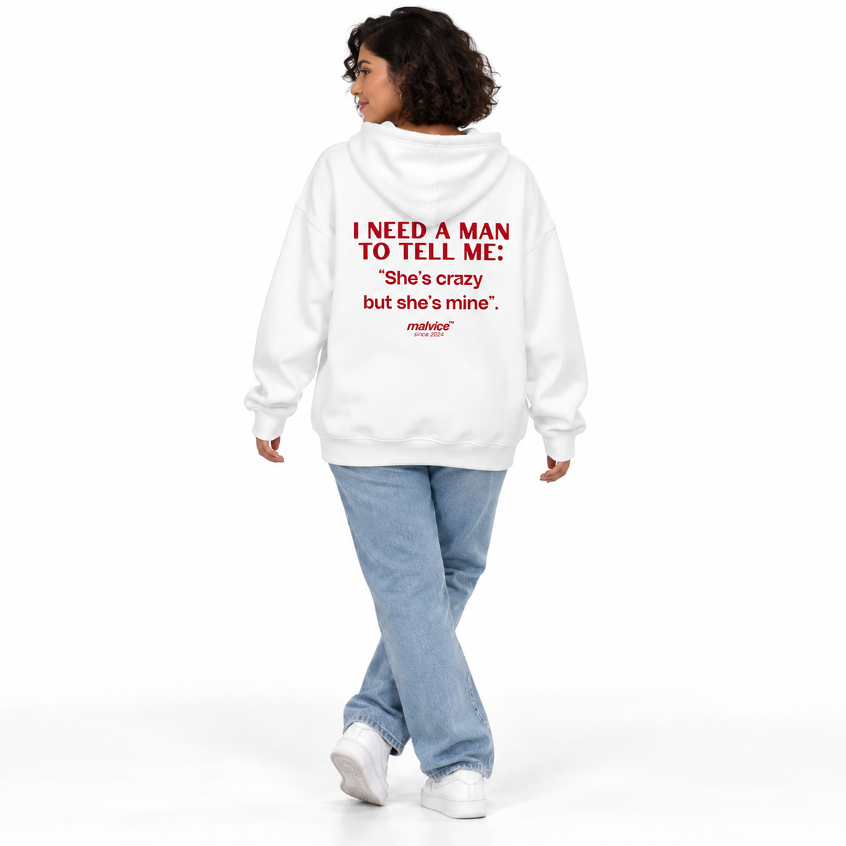 I NEED A MAN TO TELL ME: She’s crazy but she’s mine Oversized Hoodie white young adult model back view