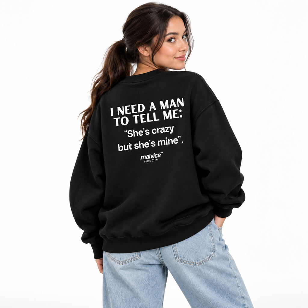 I NEED A MAN TO TELL ME: She’s crazy but she’s mine Oversized Sweatshirt black young adult model back view