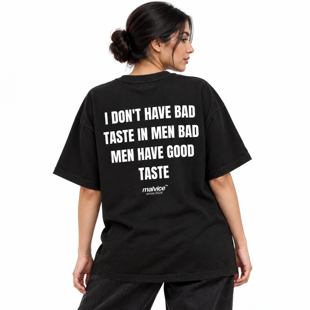 I DON'T HAVE BAD TASTE IN MEN BAD MEN HAVE GOOD TASTE Oversized T-Shirt black young adult model back view