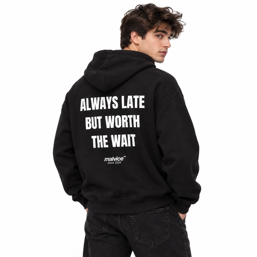 ALWAYS LATE BUT WORTH THE WAIT Oversized Hoodie black young adult model back view