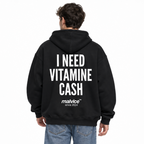 I NEED VITAMIN CASH Oversized Hoodie — black Hoodie on man model, white studio