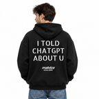 I TOLD CHATGPT ABOUT U Oversized Hoodie — black Hoodie on man model, white studio