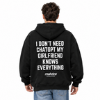 I DON'T NEED CHATGPT MY GIRLFRIEND KNOWS EVERYTHING Oversized Hoodie — black Hoodie on man model, white studio