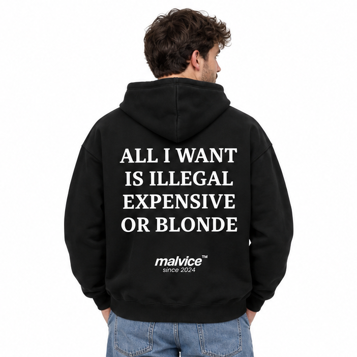 ALL I WANT IS ILLEGAL EXPENSIVE OR BLONDE Oversized Hoodie — black Hoodie on man model, white studio