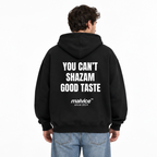 YOU CAN’T SHAZAM GOOD TASTE Oversized Hoodie — black Hoodie on man model, white studio