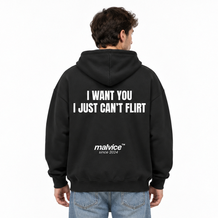 I WANT YOU I JUST CAN’T FLIRT Oversized Hoodie — black Hoodie on man model, white studio