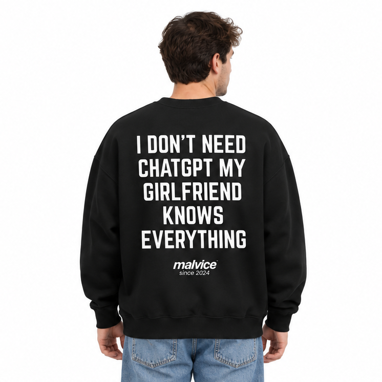 I DON'T NEED CHATGPT MY GIRLFRIEND KNOWS EVERYTHING Oversized Sweatshirt — black Sweatshirt on man model, white studio