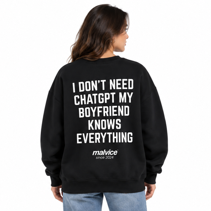 I DON'T NEED CHATGPT MY BOYFRIEND KNOWS EVERYTHING Oversized Sweatshirt — black Sweatshirt on woman model, white studio