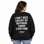 I DON'T NEED CHATGPT MY BOYFRIEND KNOWS EVERYTHING Oversized Sweatshirt — black Sweatshirt on woman model, white studio