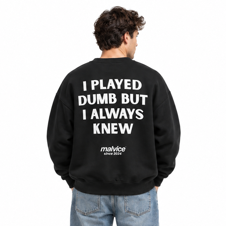 I PLAYED DUMB BUT I ALWAYS KNEW Oversized Sweatshirt — black Sweatshirt on man model, white studio