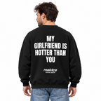 MY GIRLFRIEND IS HOTTER THAN YOU Oversized Sweatshirt — black Sweatshirt on man model, white studio