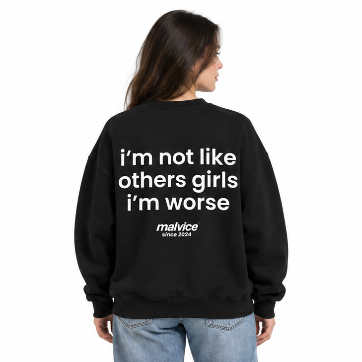 I'M NOT LIKE OTHER GIRLS I'M WORSE Oversized Sweatshirt — black Sweatshirt on woman model, white studio