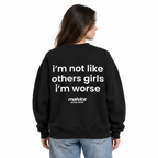 I'M NOT LIKE OTHER GIRLS I'M WORSE Oversized Sweatshirt — black Sweatshirt on woman model, white studio