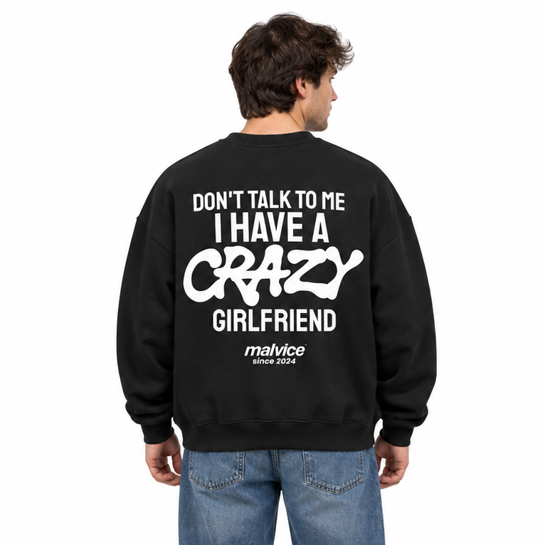DON'T TALK TO ME I HAVE A CRAZY GIRLFRIEND Oversized Sweatshirt — black Sweatshirt on man model, white studio