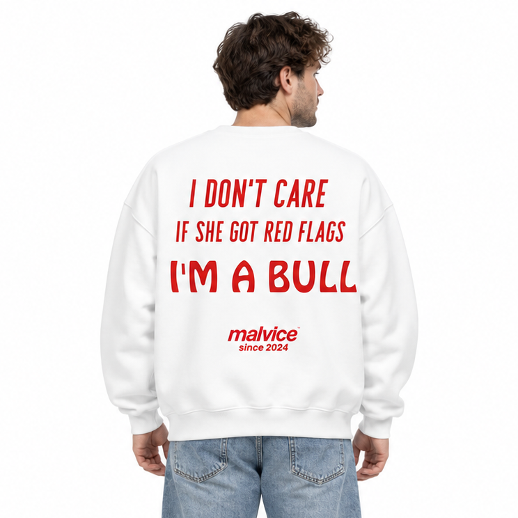 I DON'T CARE IF SHE GOT RED FLAGS I'M A BULL Oversized Sweatshirt — white Sweatshirt on man model, white studio