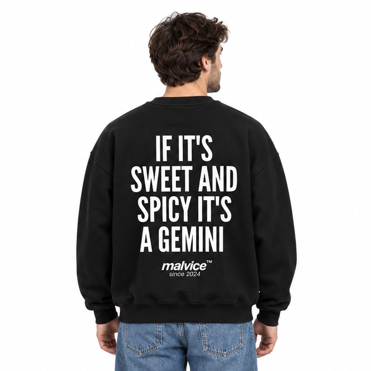 IF IT'S SWEET AND SPICY IT'S A GEMINI Oversized Sweatshirt — black Sweatshirt on man model, white studio
