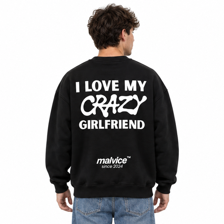 I LOVE MY CRAZY GIRLFRIEND Oversized Sweatshirt — black Sweatshirt on man model, white studio