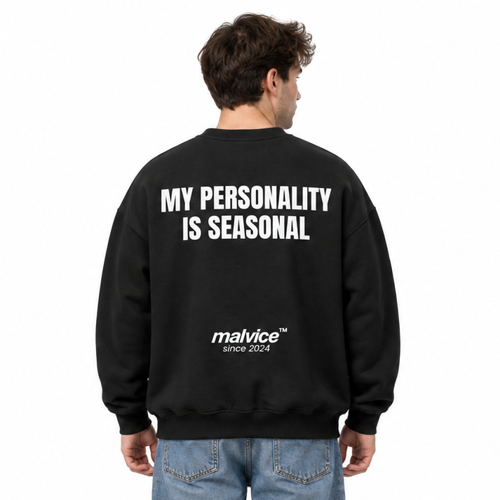 MY PERSONALITY IS SEASONAL Oversized Sweatshirt — black Sweatshirt on man model, white studio